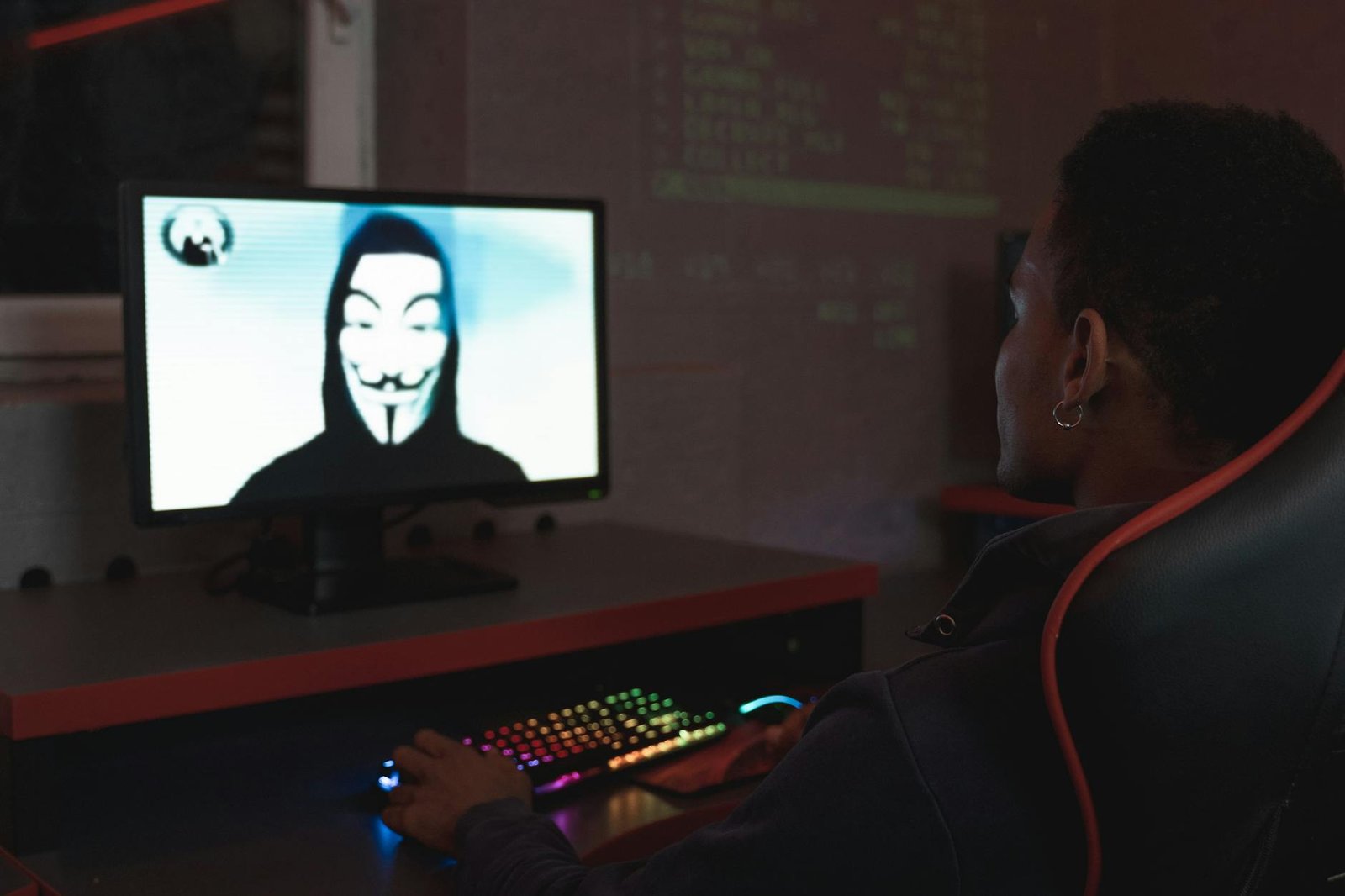 A security analyst at a workstation reviewing dependency manifests, illustrating manual lockfile verification after a Composer supply chain attack